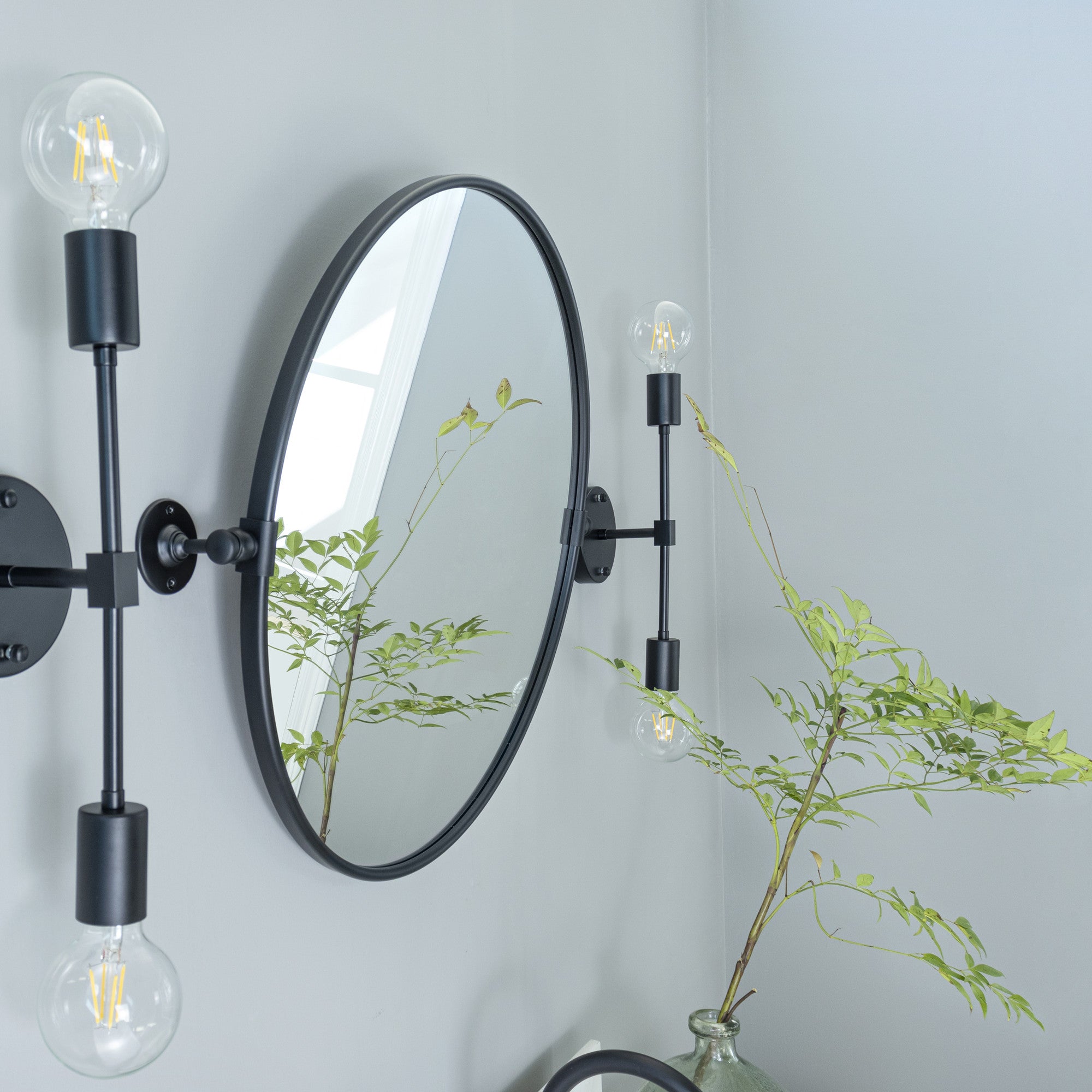 Round Stainless Steel Framed Pivoting Wall Mounted Bathroom Vanity Mirror